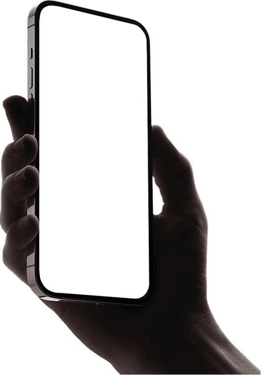 Hand holding a smartphone with a blank screen against a dark background.